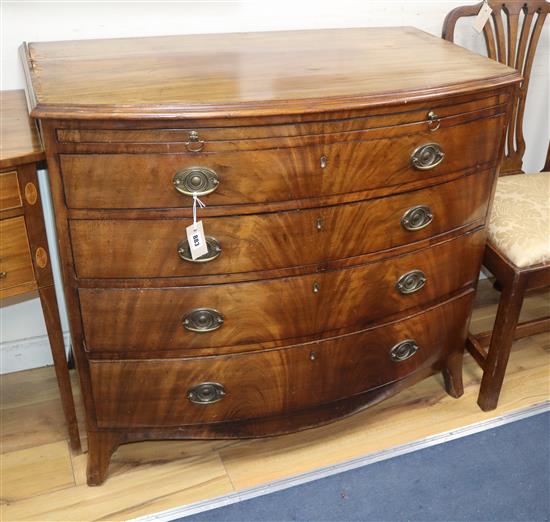 A Regency mahogany bowfront chest with brushing slide W.100cm